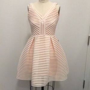 Maje - Pretty in pink fit & flare dress. Versatile, wear to any event!